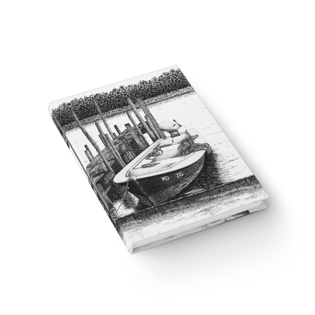 Notebook with a black and white illustration of a boat on a white background